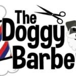 Logo for "The Doggy Barber" featuring a barber pole with red, white, and blue stripes, a cartoon dog with a mustache and beard, and a pair of scissors above the text.