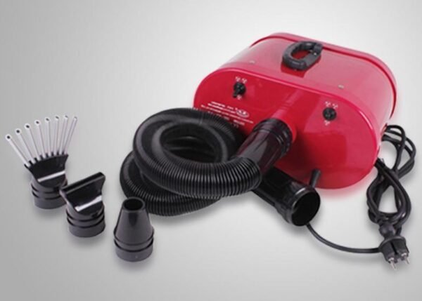 K9 Trailer Rentals The Lazor RX 2300W Twin Motor Dryer—Portable & Wall—is shown in red with a black flexible hose, multiple nozzle attachments, and a power cord on a light gray background.