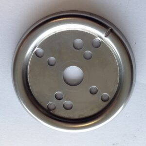 K9 Trailer Rentals The Steel Bezel Plate for Savel Hydrobath Dial is a round metal disc with a central hole, two rings of smaller surrounding holes, and a slight notch on the outer edge, shown against a white background.